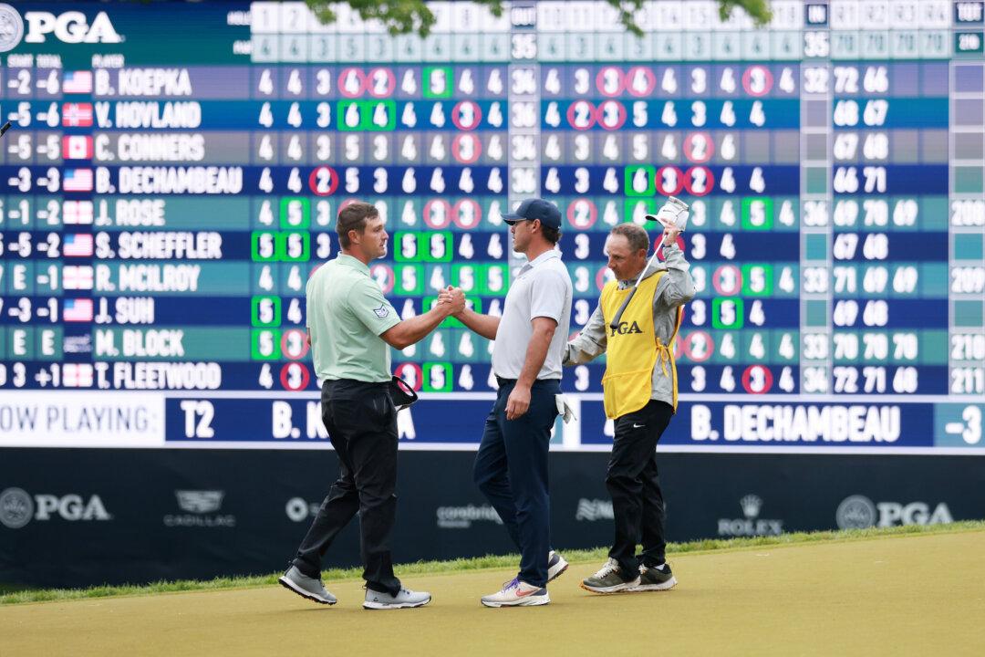 Brooks Koepka Powers Ahead at Waterlogged PGA Championship