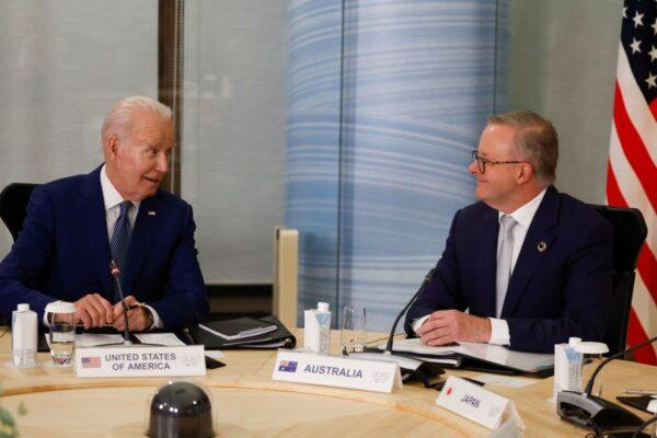 US President Joe Biden (L) and Australia's Prime Minister Anthony Albanese attend a quad meeting on the sidelines of the G-7 Leaders' Summit in Hiroshima, Japan, on May 20, 2023. (Photo by JONATHAN ERNST/POOL/AFP via Getty Images)