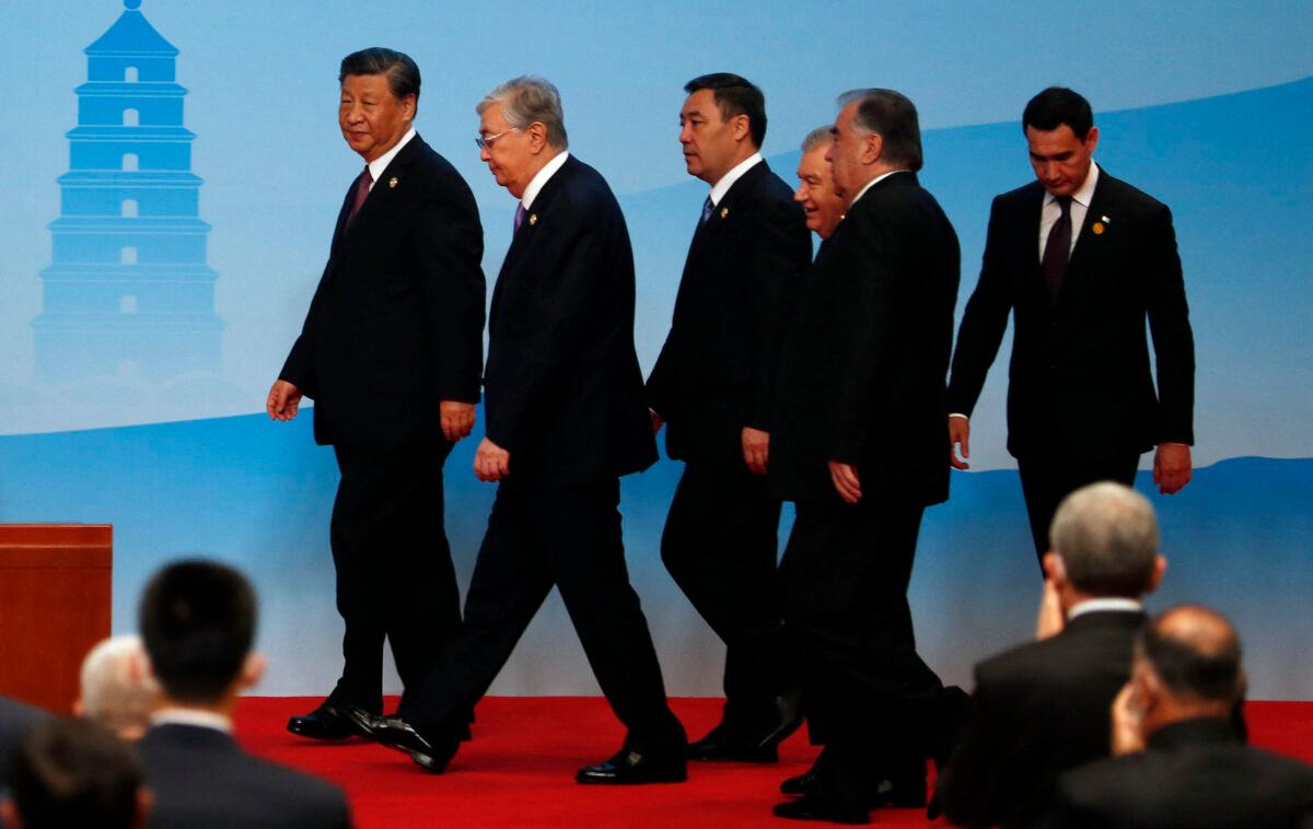 (L–R) Chinese leader Xi Jinping, Kazakhstan's President Kassym-Jomart Tokayev, Kyrgyzstan's President Sadyr Japarov, Uzbekistan's President Shavkat Mirziyoyev, Tajikistan's President Emomali Rahmon, and Turkmenistan's President Serdar Berdymukhamedov arrive for the joint press conference of the China-Central Asia Summit in Xian, Shaanxi Province, China, on May 19, 2023. (Florence Lp/POOL/AFP via Getty Images)