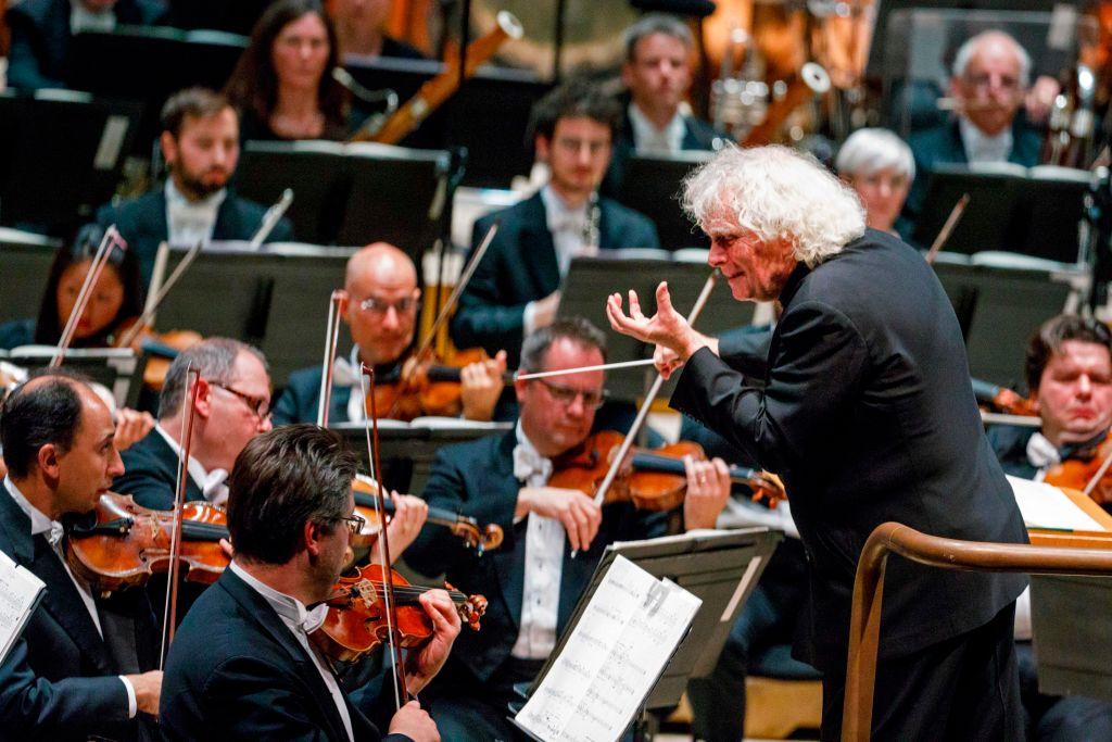 The London Symphony Orchestra's Music Director, Simon Rattle, conducts the LSO at The Barbican in London on Sept. 14, 2017.<br/>(Tolga Akmen/AFP via Getty Images)