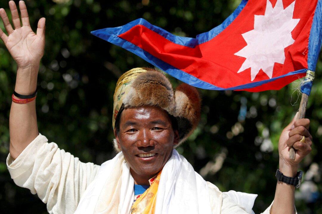 Nepali Sherpa Scales Everest for 28th Time as Death Toll Rises to 11