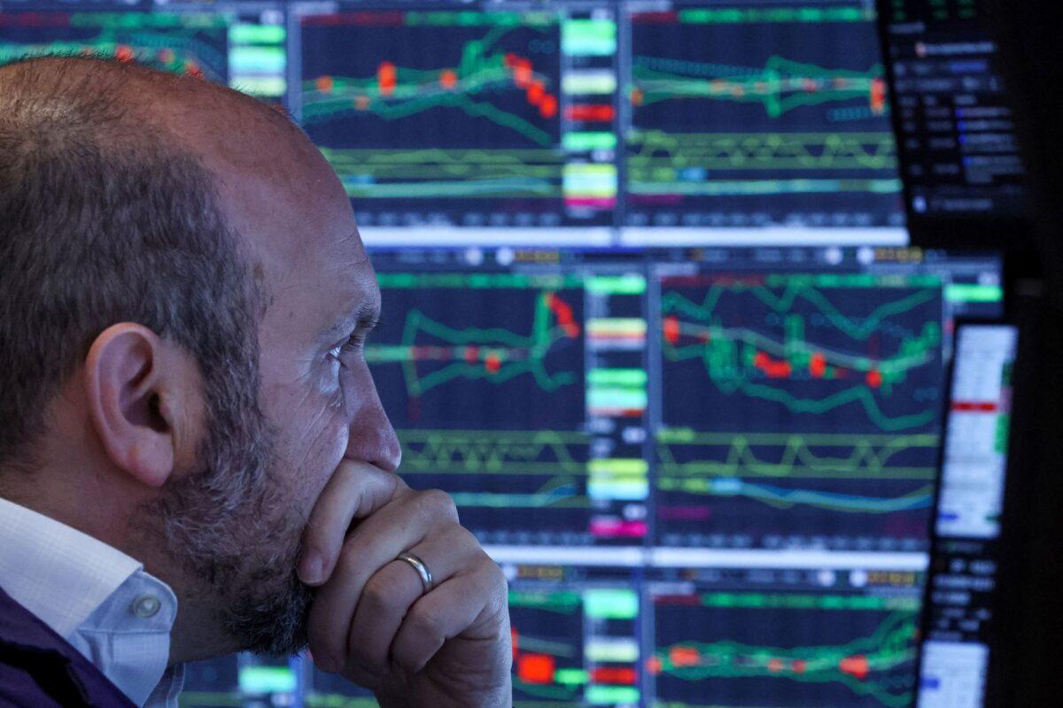 A trader works on the floor of the New York Stock Exchange on May 22, 2023. (Brendan McDermid/Reuters)