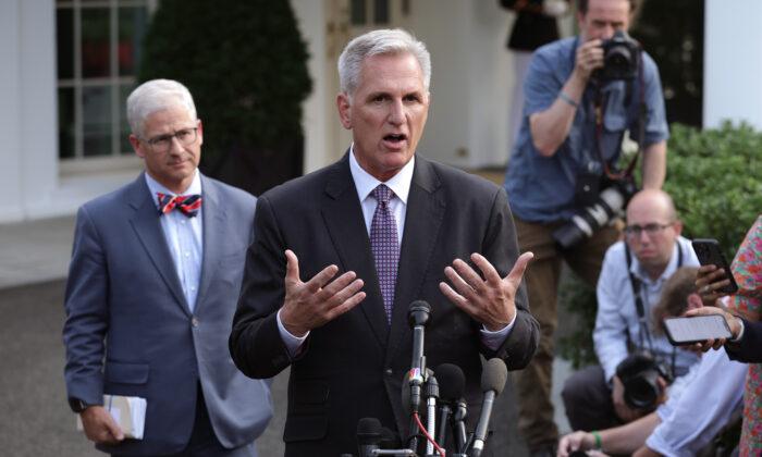 House Speaker Kevin McCarthy (R-Calif.), joined by Rep. Patrick McHenry (R-N.C.), speaks to reporters at the White House on May 22, 2023. (Alex Wong/Getty Images)