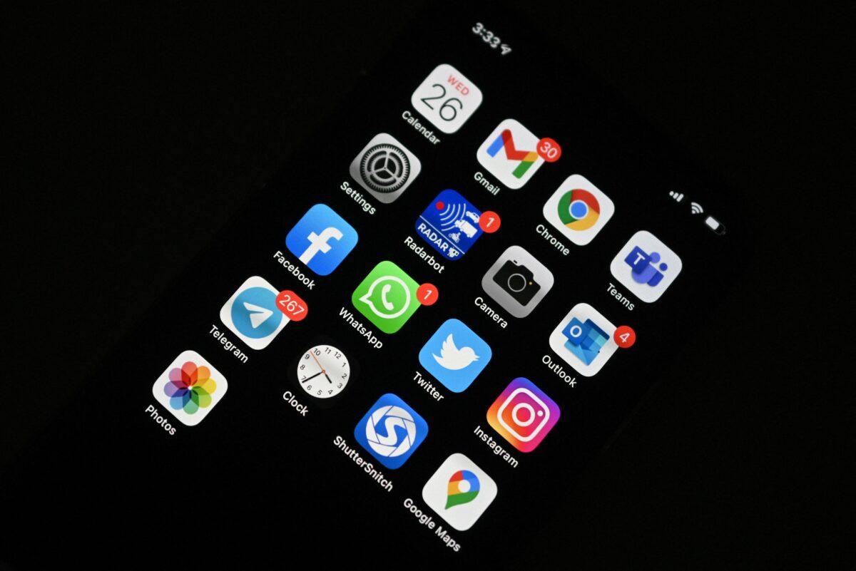 The icon of the mobile messaging service application WhatsApp (3rd row, 2nd column) is seen on the screen of a smartphone on May 26, 2021. (Sajjad Hussain/AFP via Getty Images)