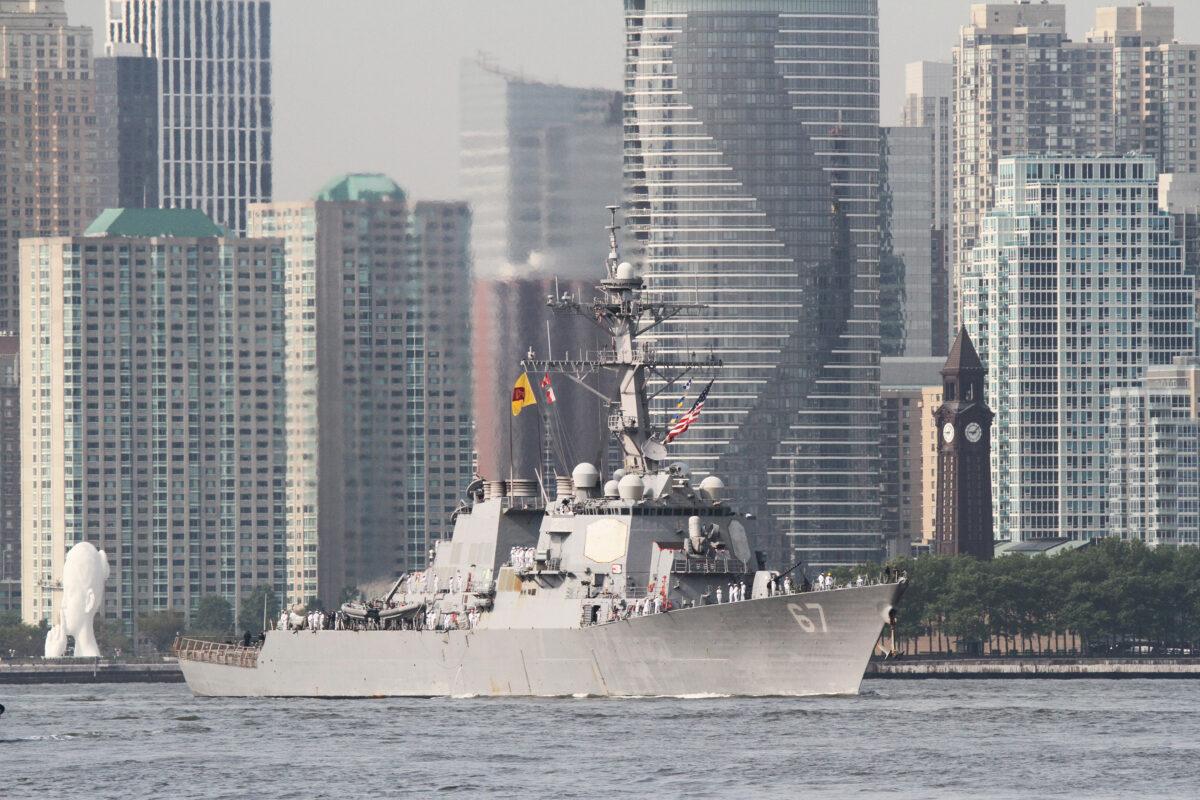 The Arleigh Burke class guided-missile destroyer USS Cole sails up the Hudson River in New York on May 23, 2023. (Richard Moore/The Epoch Times)