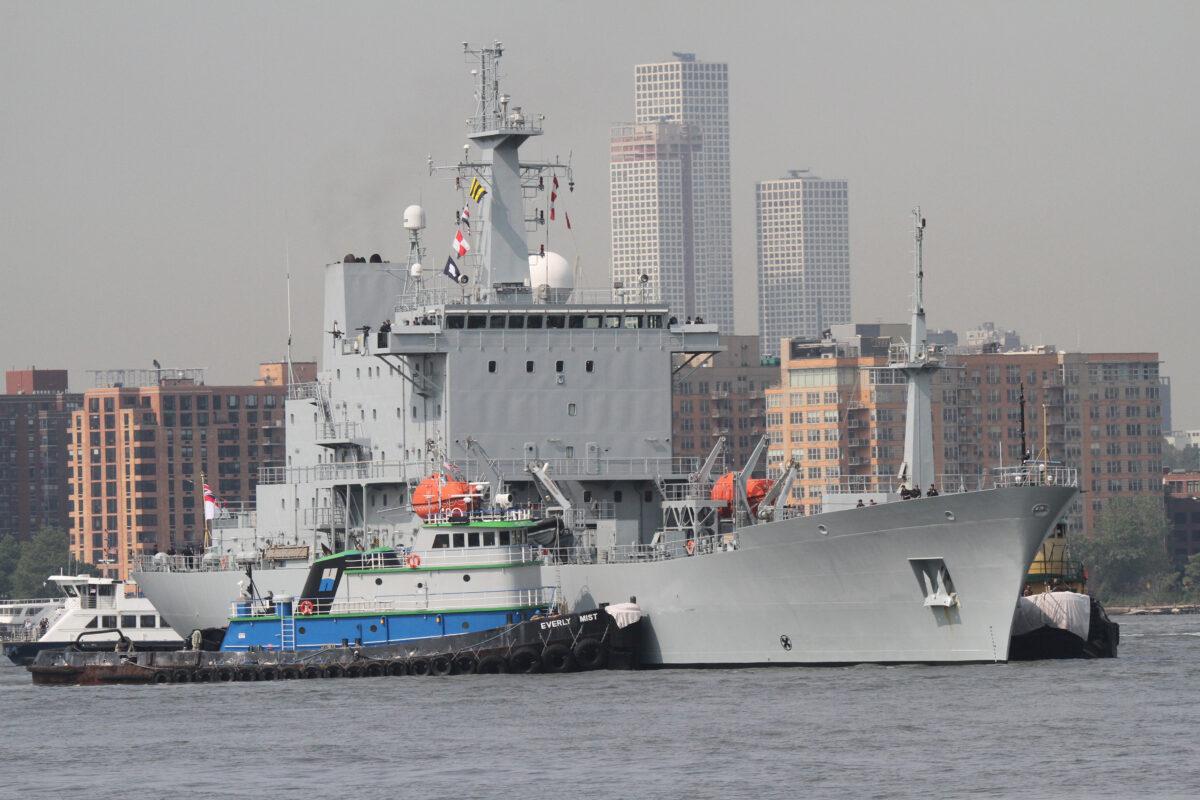 HMS Scott, the UK Royal Navy's ocean survey vessel, with some friends on the Hudson River in New York on May 24, 2023. (Richard Moore/The Epoch Times)