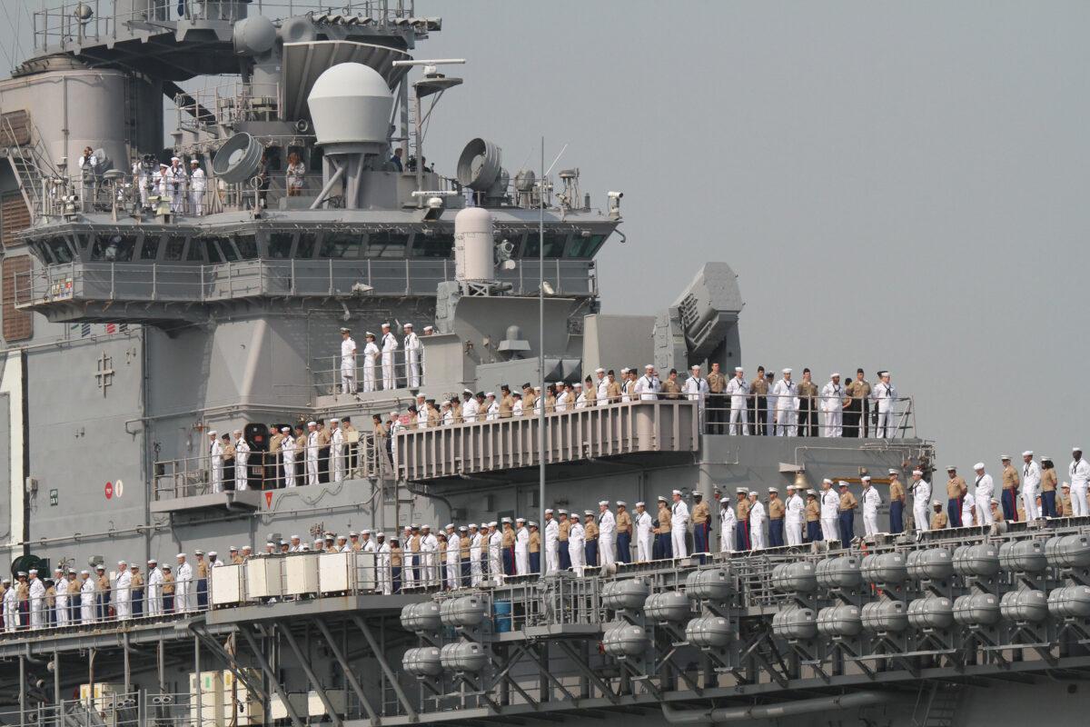 Crew of the USS Wasp amphibious assault ship on the Hudson River in New York on May 24, 2023. (Richard Moore/The Epoch Times)