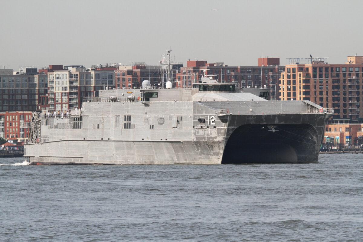 The Spearhead class fast transport USNS Newport (Norfolk, Va.) is operated by the United States Navy's Military Sealift Command and has a top speed of 43 knots. (Richard Moore/The Epoch Times)