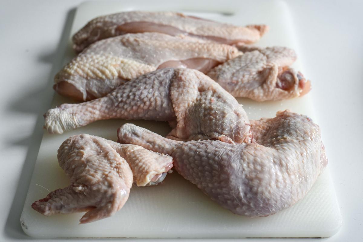 Be sure to use bone-in chicken pieces, and take them out of the fridge and salt them 1 hour before you start cooking. (Audrey Le Goff)