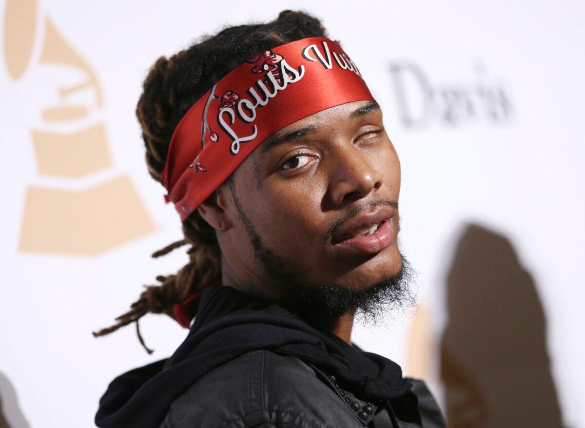 Fetty Wap arrives at the 2016 Clive Davis Pre-Grammy Gala at the Beverly Hilton Hotel in Beverly Hills, Calif., on Feb. 14, 2016. (John Salangsang/Invision/AP)