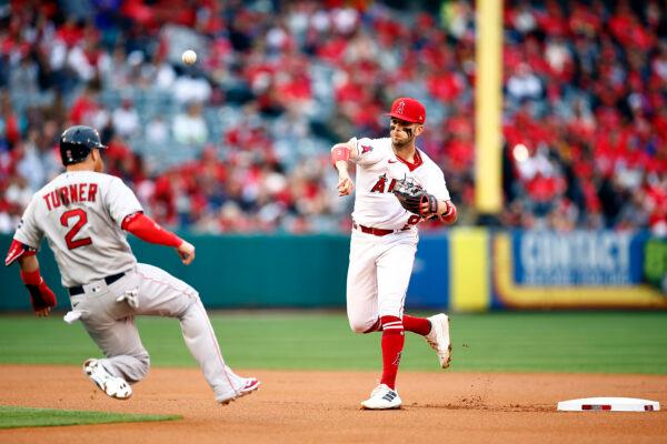 Zach Neto (9) of the Los Angeles Angels makes the out against Justin Turner (2) of the Boston Red Sox in the first inning at Angel Stadium of Anaheim in Anaheim, Calif., on May 24, 2023. (Ronald Martinez/Getty Images)