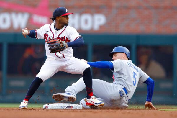 Freddie Freeman (5) of the Los Angeles Dodgers is out at second as Ozzie Albies (1) of the Atlanta Braves makes the play during the first inning at Truist Park in Atlanta on May 24, 2023. (Todd Kirkland/Getty Images)