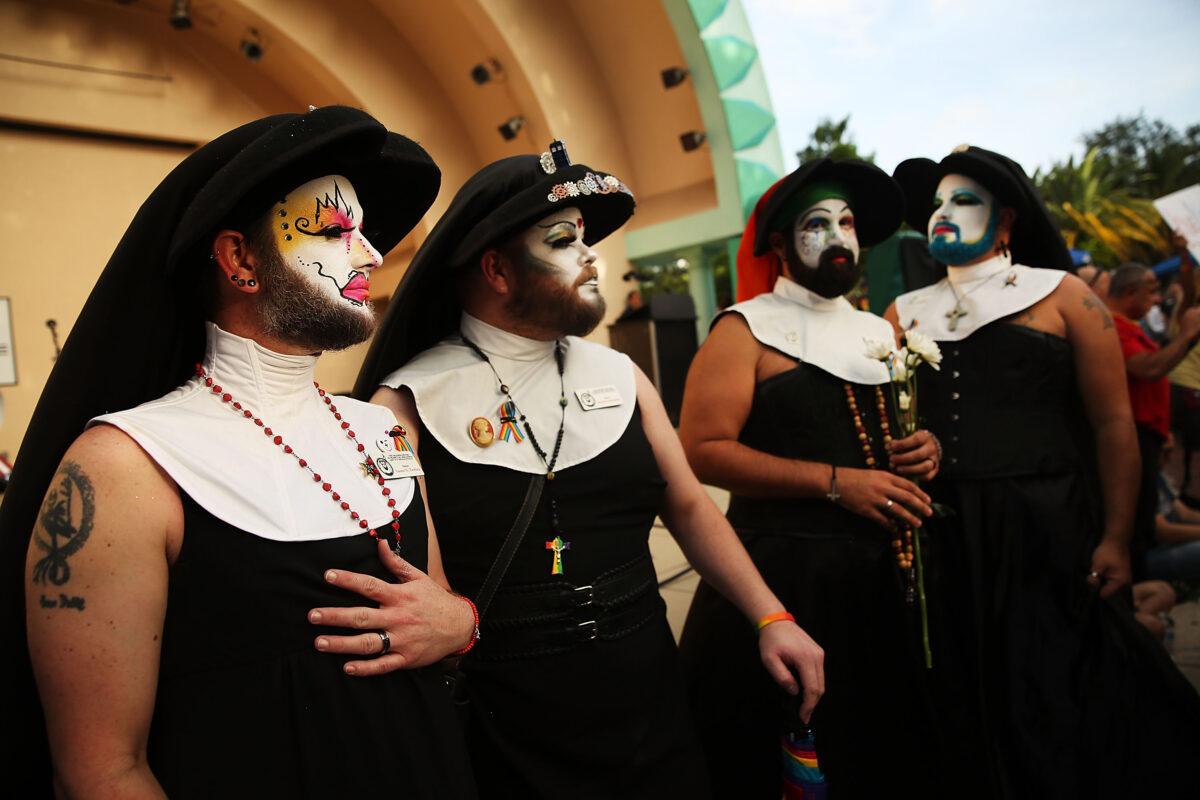 Members of the Sisters of Perpetual Indulgence honor the 49 people killed at a gay nightclub in Florida at a memorial service in Orlando on June 19, 2016. (Spencer Platt/Getty Images)