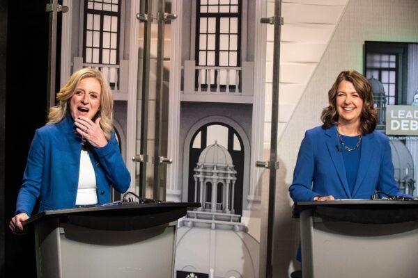 Alberta NDP Leader Rachel Notley (L) and United Conservative Party Leader Danielle Smith prepare for a debate in Edmonton on May 18, 2023. (The Canadian Press/Jason Franson)