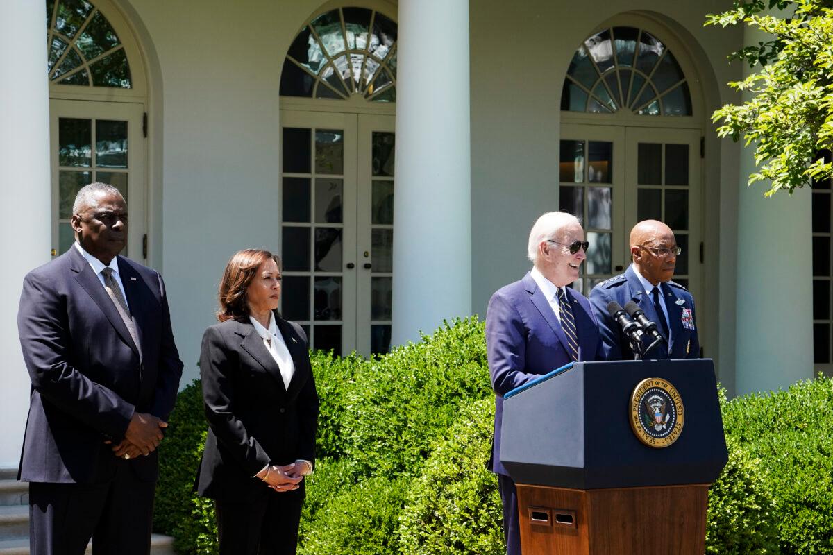 Secretary of Defense Lloyd Austin (L) and Vice President Kamala Harris (C) attend a Rose Garden event where President Joe Biden (C) announces that Gen. Charles Q. Brown (R) will serve as the next chairman of the Joint Chiefs of Staff at the White House on May 25, 2023. (Madalina Vasiliu/The Epoch Times)