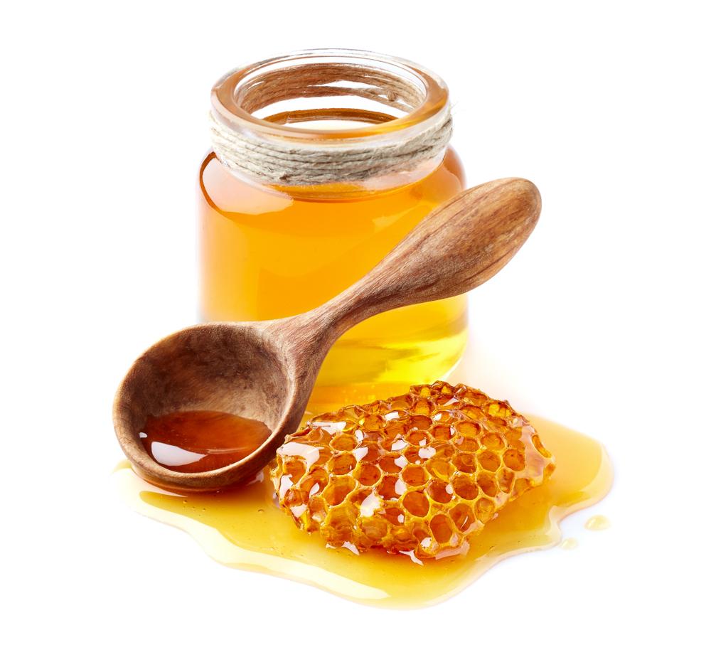 Raw honey can be consumed straight from the honey comb after being filtered to remove bits of beeswax and other debris. (Dionisvera/Shutterstock)