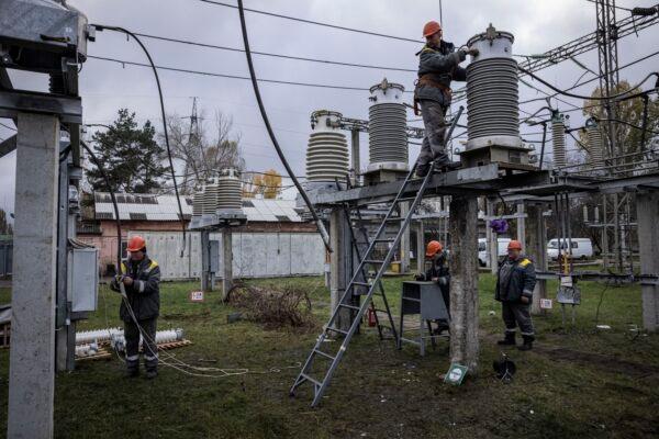 Workers repair infrastructure in a power station that was damaged by a Russian air attack in Kyiv Oblast, Ukraine, on Nov. 4, 2022. (Ed Ram/Getty Images)