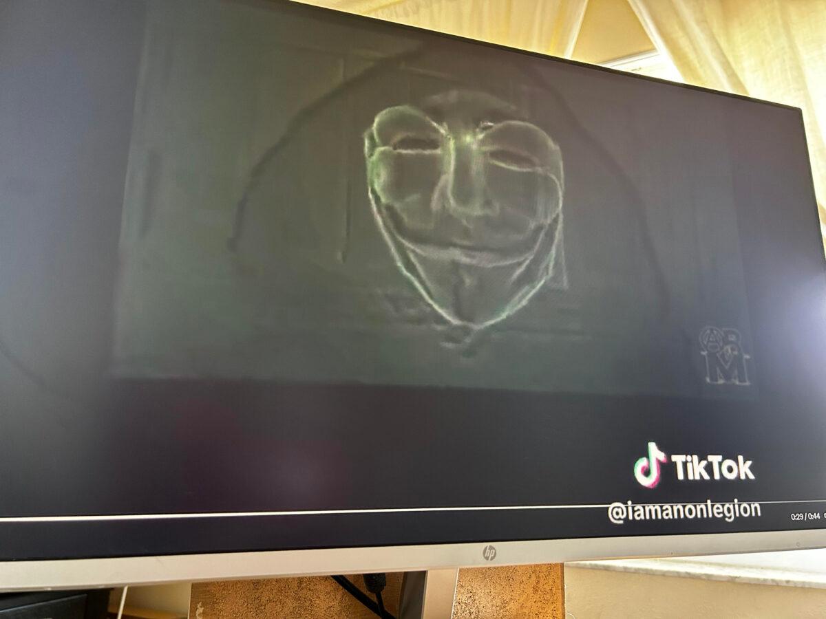 A screenshot of a video that Anonymous posted on its TikTok page after it attacked the website of parental rights group Moms for Liberty on May 24, 2023. (Patricia Tolson/The Epoch Times)