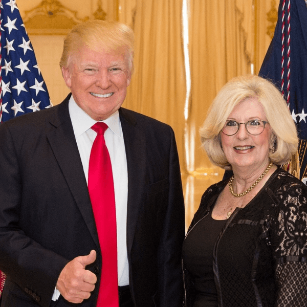 Donald Trump, the 45th president of the United States, poses with Sue Snowden, a founder of Club 45 USA, which has been renamed Club 47 USA in support of Trump's 2024 reelection bid. (Courtesy of Larry Snowden)