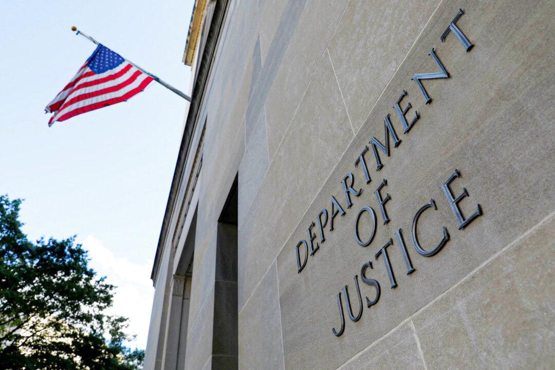 DOJ Charges 2 Suspected Chinese Agents for Targeting Falun Gong in US