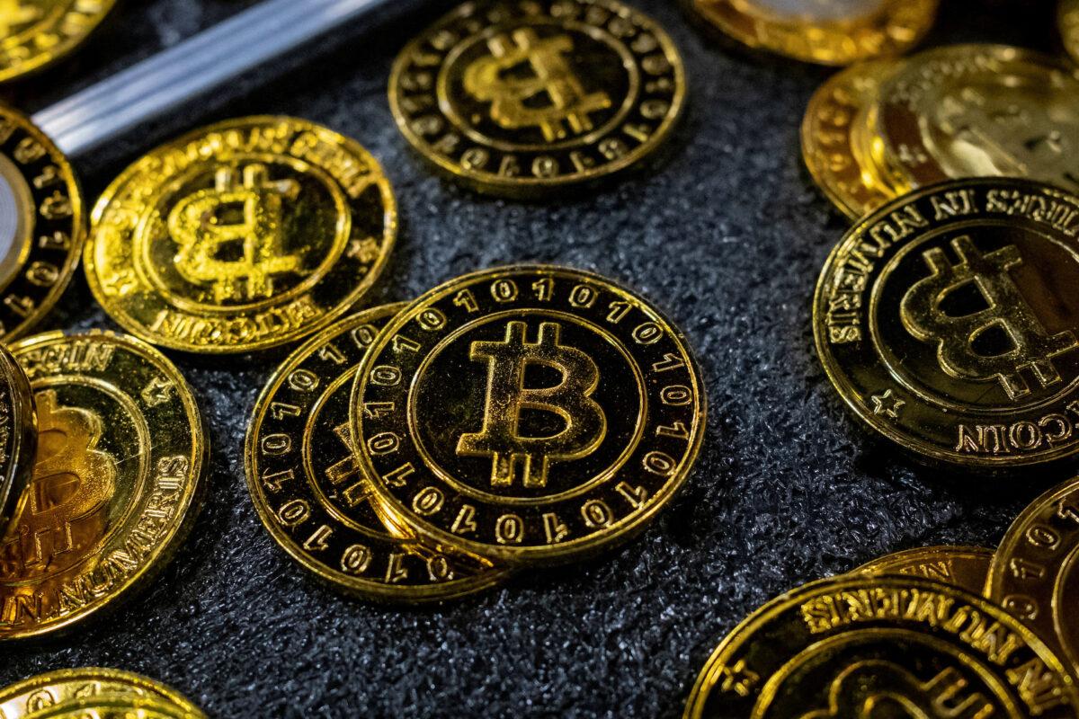 Bitcoin coins are seen at a stand during the Bitcoin Conference 2023, in Miami Beach, Florida, on May 19, 2023. (Marco Bello/Reuters/File Photo)