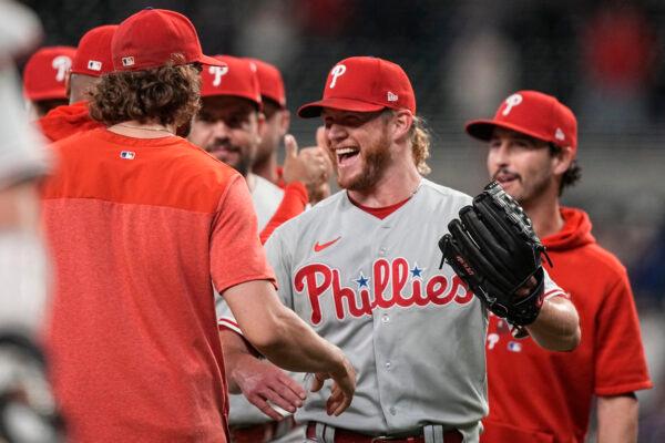 Philadelphia Phillies relief pitcher Craig Kimbrel, center, celebrates with teammates after a baseball game against the Atlanta Braves in Atlanta on May 26, 2023. (Brynn Anderson/AP Photo)