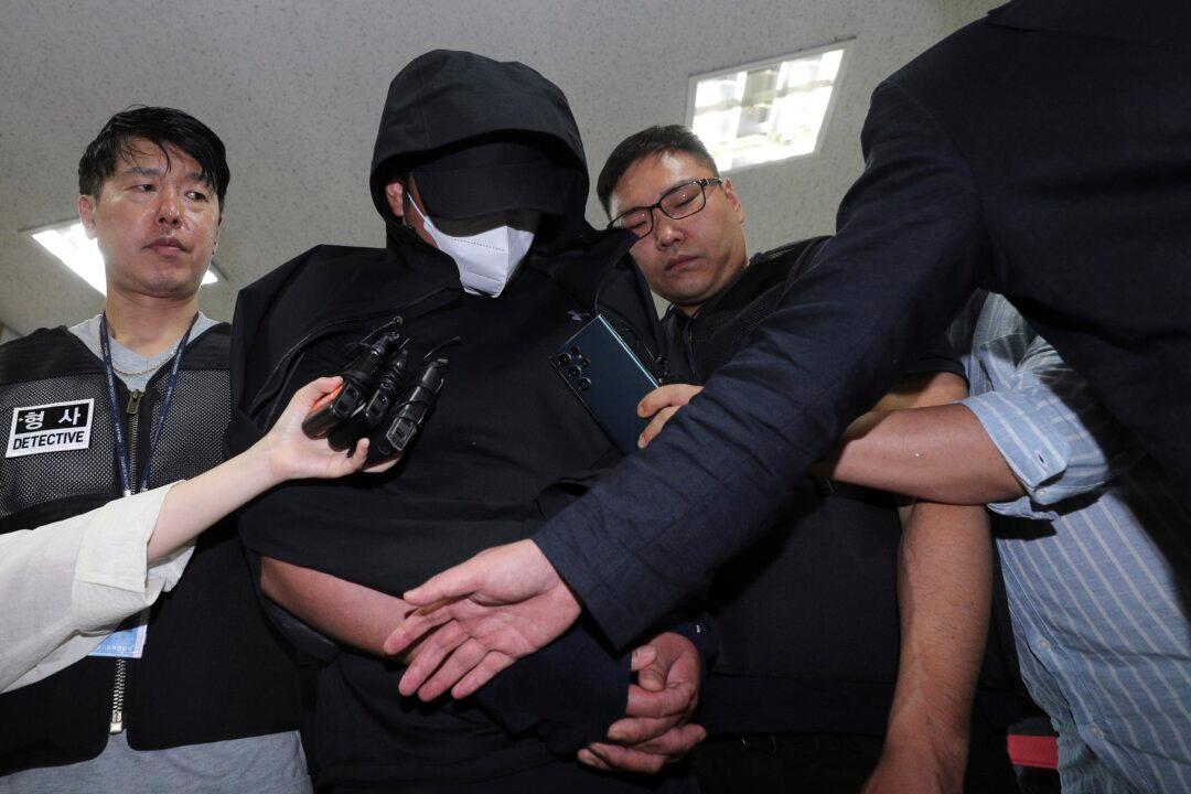 South Korean Arrested for Opening Plane Exit Door Mid-Air, Faces up to 10 Years in Prison