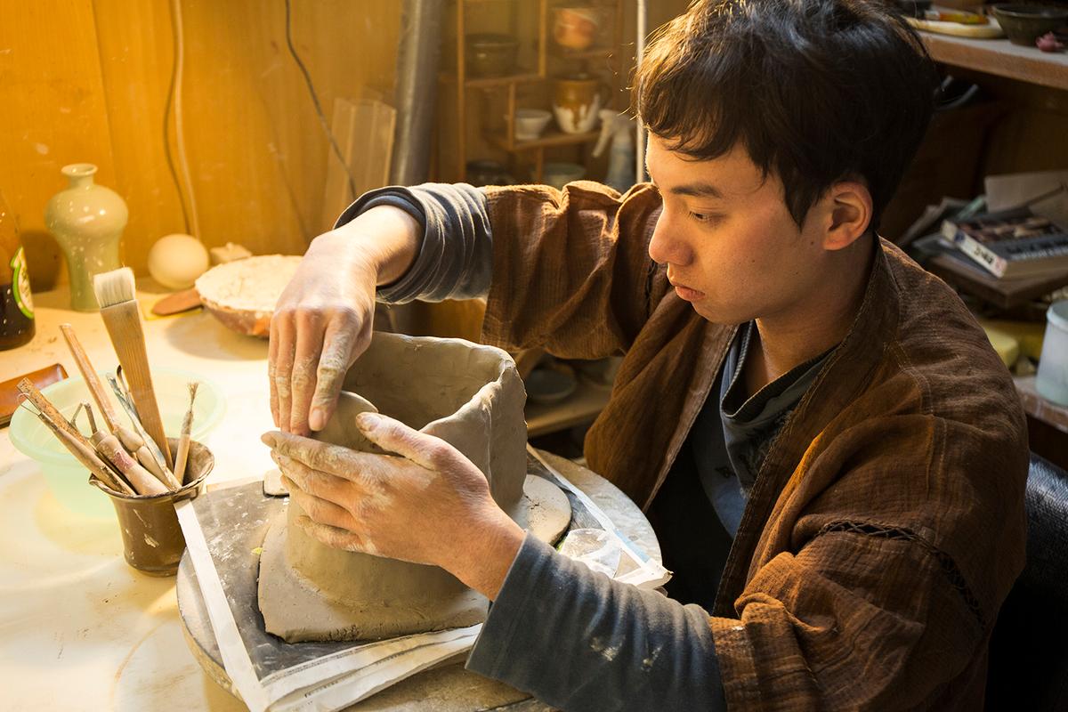 Hsu Ting Chia in his studio. He believes each piece of pottery brings a unique set of values to its owner and can become an integral part of their life. (Courtesy of Hsu Ting Chia)