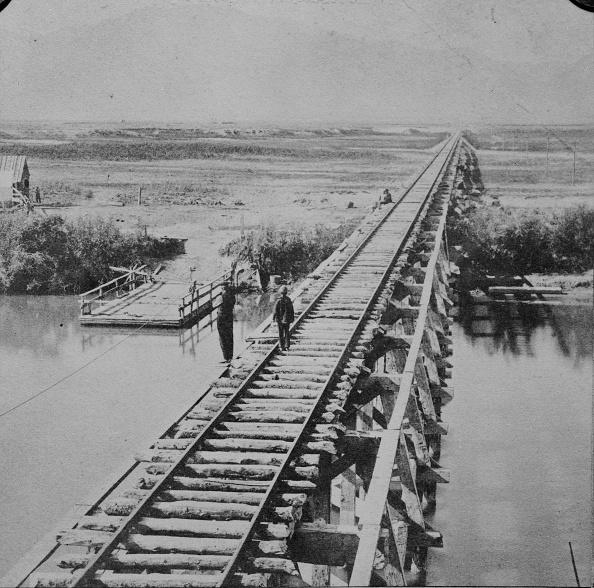 The Union Pacific Railroad across the Bear River in Utah, next to the Bear River ferry, circa 1870. (Andrew J. Russell/Archive Photos/Getty Images)