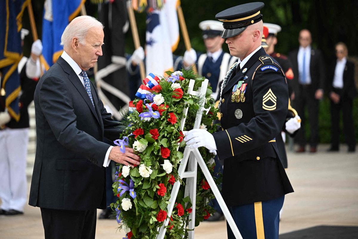 President Joe Biden participates in a wreath-laying ceremony at the Tomb of the Unknown Soldier in Arlington National Cemetery in Arlington, Va., on May 29, 2023. (Mandel Ngan/AFP via Getty Images)