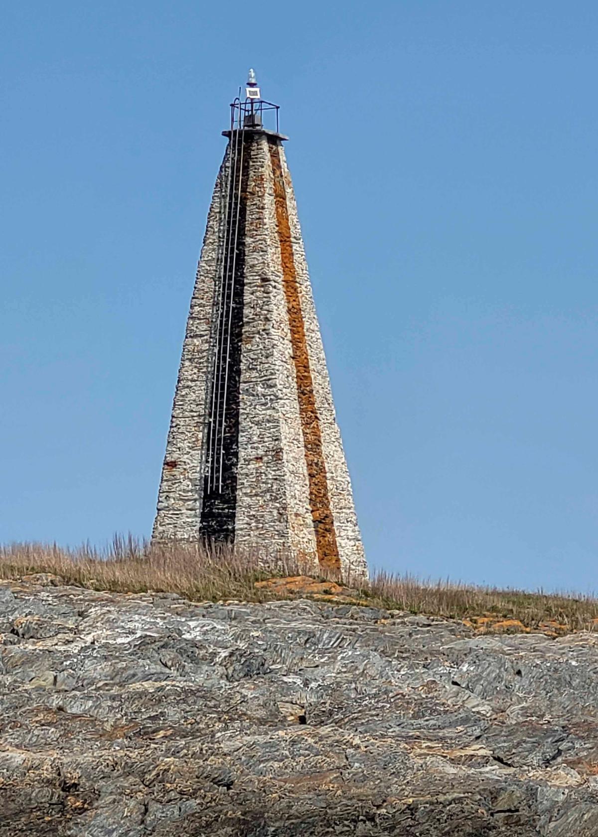 Little Mark Island and Monument stands between Broad Sound and Casco Bay off the coast of Harpswell, Maine. (Barbara Salfity/General Services Administration via AP)