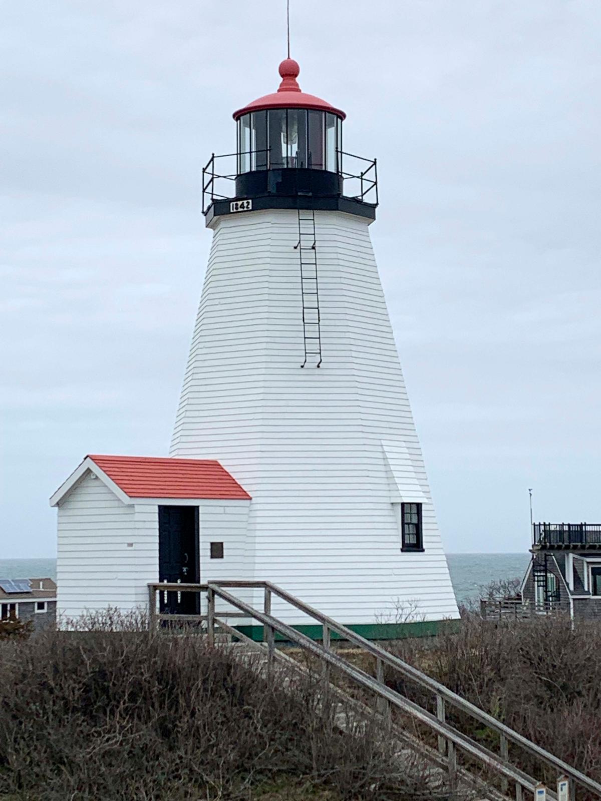 Plymouth Light Station, with an octagonal wooden structure dating to 1842, stands near Cape Cod Bay and Plymouth Bay in Plymouth, Massachusetts. (Paul Hughes/General Services Administration via AP)