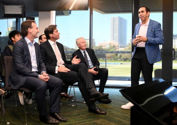 Andrew Dillon, AFL CEO Gillon McLachlan and Tennis Australia CEO Craig Tiley speak to Eddie Betts during a media opportunity with Australian sports governing body representatives who will support The Voice at CitiPower Centre in Melbourne, Australia, on May 26, 2023. (Quinn Rooney/Getty Images)