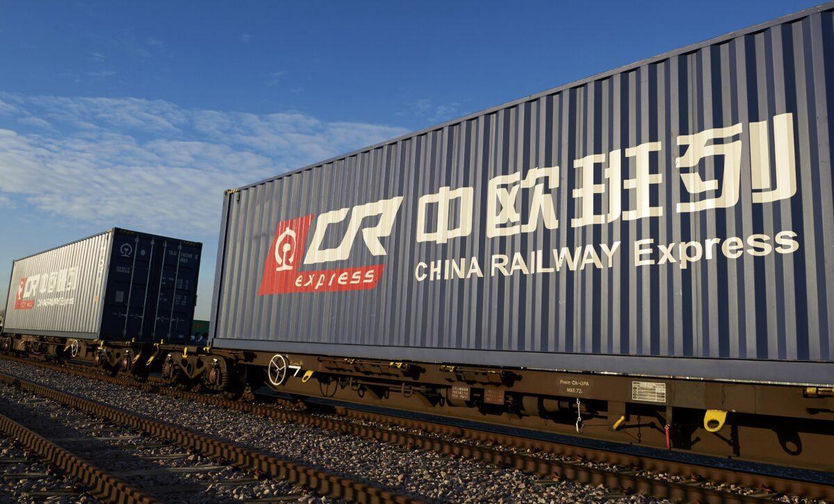 The logo of China Railway Express, a unit of China's state-run China Railway Corporation, pictured on the side of shipping containers at DB Cargo's London Eurohub rail freight depot in Barking, east London, on Jan. 18, 2017, after the freight train arrived from Yiwu in the eastern Chinese province of Zhejiang. (Niklas Halle'n/AFP via Getty Images)