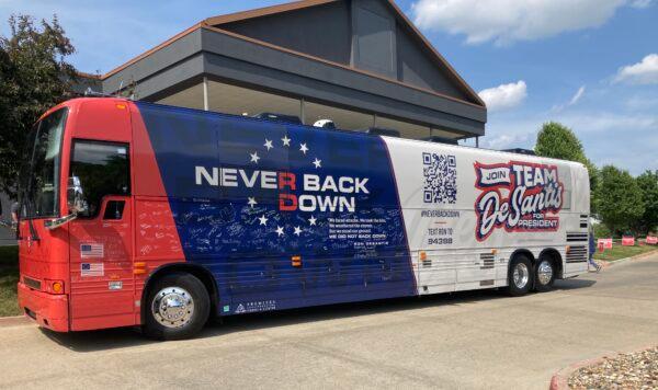 A Never Back Down campaign bus seen at Florida Gov. Ron DeSantis's first stump speech on his presidential campaign at Eternity Church in Clive, Iowa, on May 30, 2023. (John Haughey/The Epoch Times)