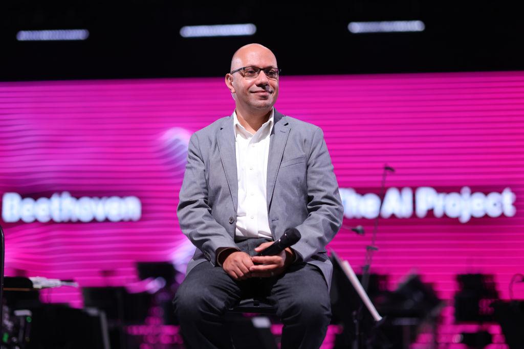 Ahmed Elgammal speaks in a Q&A during the rehearsal for the world premiere of Beethoven's 10th symphony, completed by artificial intelligence and the Beethoven Orchestra in Bonn, Germany, on Oct. 9, 2021. (Andreas Rentz/Getty Images)