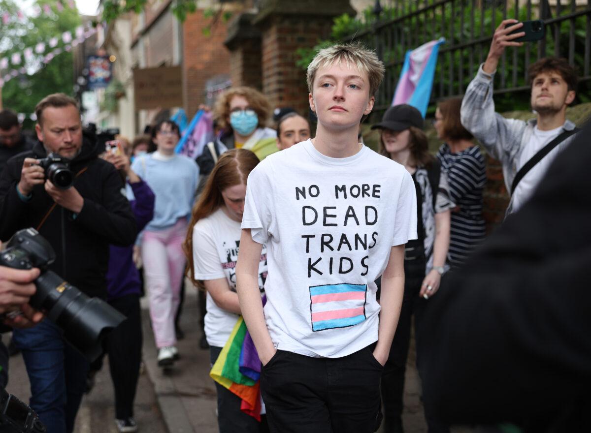 Protester Riz Possnett, who glued herself to the front of the stage where Kathleen Stock was talking, is seen outside the Oxford Union in Oxford, England, on May 30, 2023. (Eddie Keogh/Getty Images)
