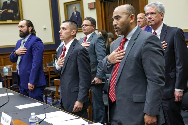 Suspended FBI special agent Garrett O’Boyle (L), former FBI agent Steve Friend, (2L), and suspended FBI agent Marcus Allen (2R) during a hearing in Washington on May 18, 2023. (Alex Wong/Getty Images)