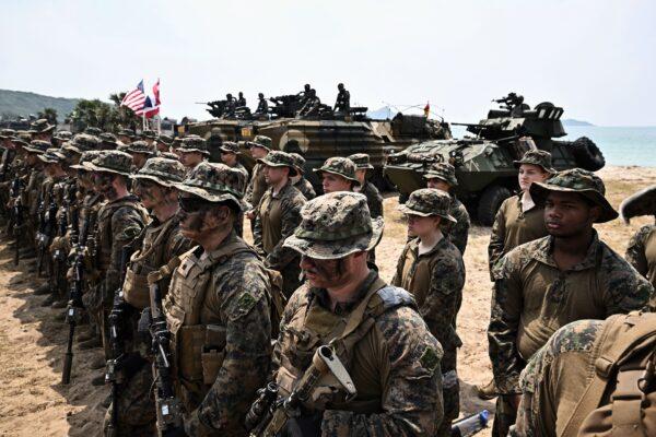  U.S. marines line up on the beach after the amphibious landing exercise during the joint Cobra Gold exercise in the coastal Thai province of Chonburi on March 3, 2023. (Lillian Suwanrumpha/AFP via Getty Images)