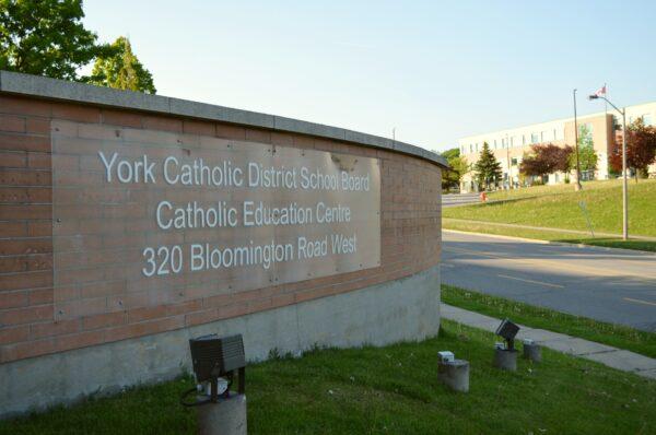 A view outside York Catholic District School Board headquarters with Cardinal Carter Catholic High School in the background in Aurora, Ont., on May 29, 2023, when the board voted not to fly the pride flag. (Tara MacIsaac/The Epoch Times)