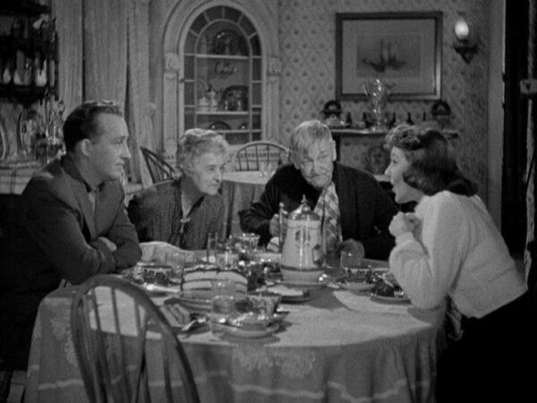 (L–R) Bob Sommers (Bing Crosby), Millie Starling (Lillian Cornell), Uncle Caleb (Charley Grapewin), and Cherry Lane (Mary Martin), in “Rhythm on the River.” (Paramount Pictures)