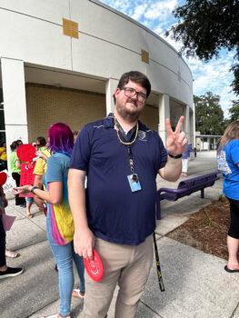 Joseph Bristol, a union member and a teacher at West Hernando Middle School, waits in line to attend the Hernando County School Board meeting in Hernando County, Fla., on May 30, 2023. (Patricia Tolson/The Epoch Times)