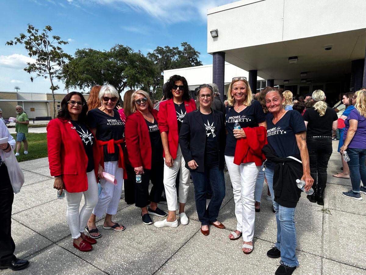 Mary Mazzuco of Weeki Wachi (L) stands with her fellow Moms for Liberty members while waiting to attend the Hernando County School Board meeting in Brooksville, Florida, on May 30, 2023. (Patricia Tolson/The Epoch Times)