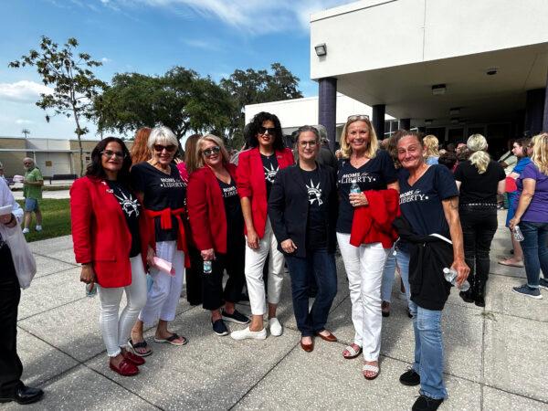 Mary Mazzuco of Weeki Wachi (L) stands with her fellow Moms for Liberty members while waiting to attend the Hernando County School Board meeting in Hernando County, Fla., on May 30, 2023. (Patricia Tolson/The Epoch Times)