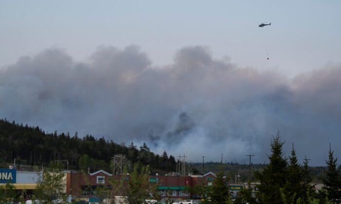 Canadian Military to Help Fight Raging Nova Scotia Wildfires Amid ‘Unprecedented’ Season