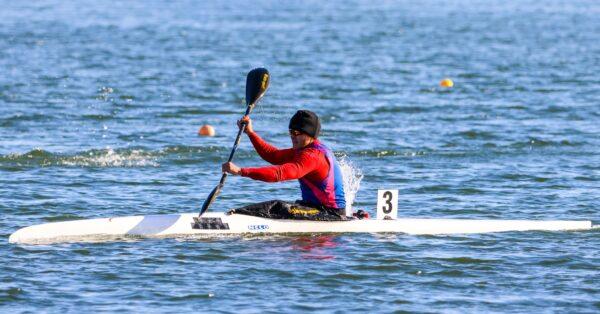 Zachary Alva sprints in his kayak on Lake Natoma in Folsom, Calif., on April 13, 2023. (Courtesy of Schonna Schenk)