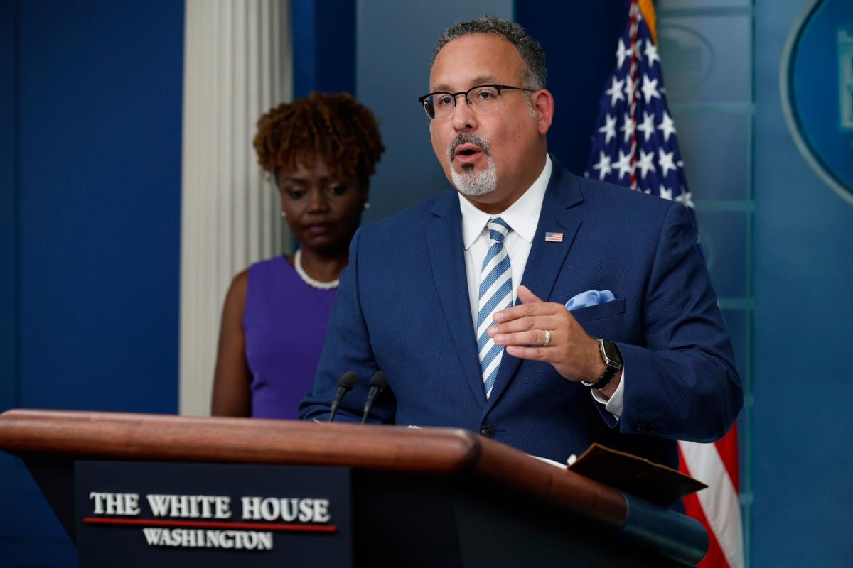 White House press secretary Karine Jean-Pierre (L) and Education Secretary Miguel Cardona talk to reporters during the daily news conference in the Brady Press Briefing Room at the White House on June 30, 2023. (Chip Somodevilla/Getty Images)