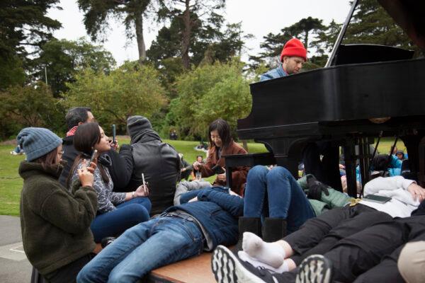 Noack allows attendees to feel the vibrations beneath his piano. (Lear Zhou/The Epoch Times)