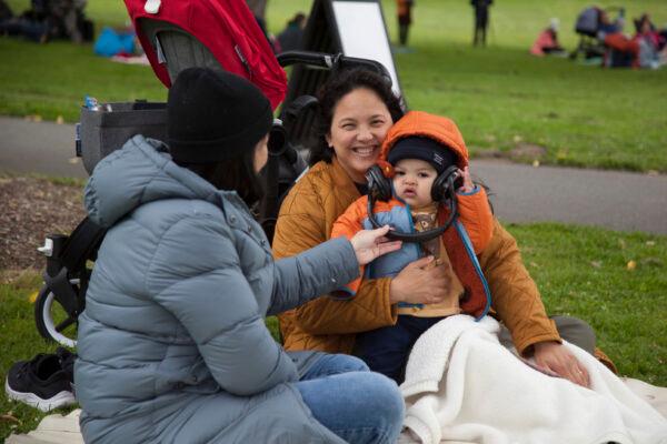 Families find joy in an outdoor classical music concert at Golden Gate Park in San Francisco. (Lear Zhou/The Epoch Times)