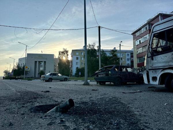 An ammunition casing in a damaged street after Ukrainian shelling in the town of Shebekino in the Belgorod region in a handout image released on May 31, 2023. (Governor of Russia's Belgorod Region Vyacheslav Gladkov via Telegram/Handout via Reuters)